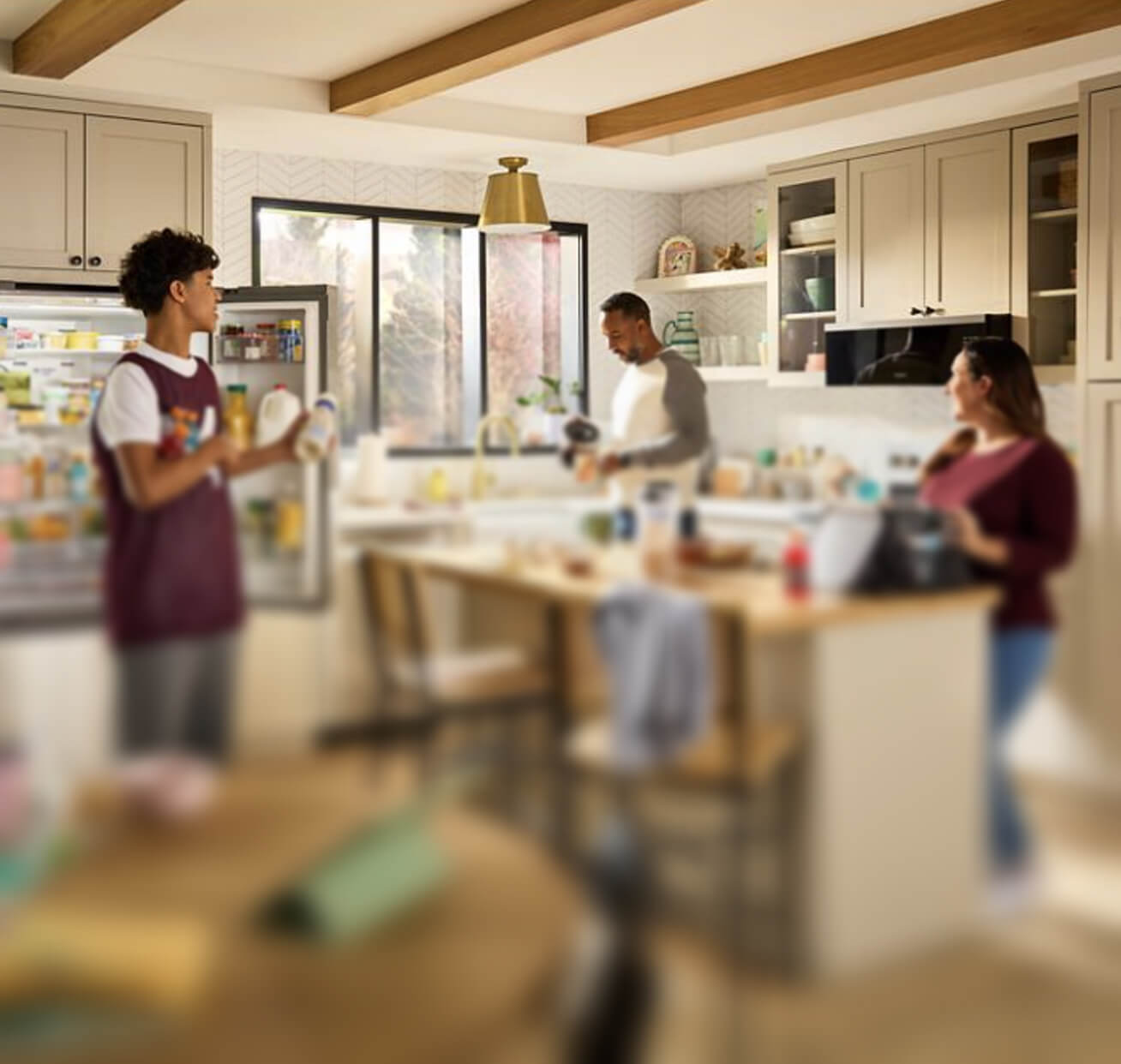 A family hanging out in a kitchen